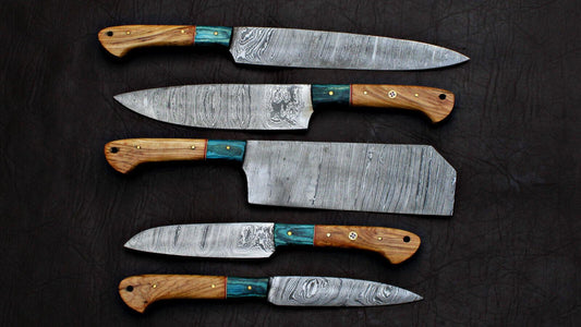 Complete 5 pieces Damascus steel kitchen knife set displayed with protective storage sheaths.