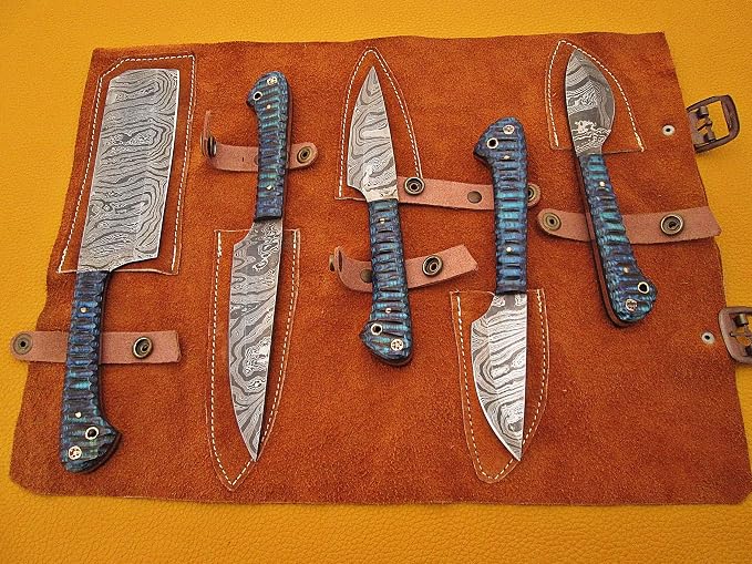 5 piece Damascus steel knife set with blue and grey acrylic handles inside open leather roll case with individual sheaths