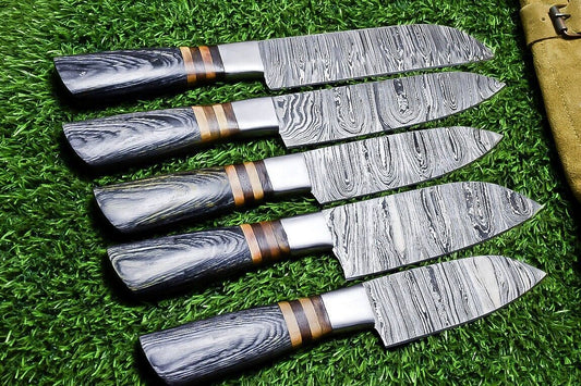 5 pieces custom Damascus kitchen knife set with hand forged 384 layer steel blades and hardwood handles with steel bolsters.