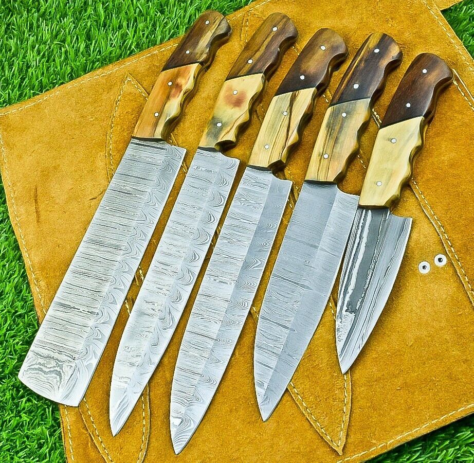Detail view of 384 layer hand forged Damascus steel blade pattern on a custom professional kitchen knife.