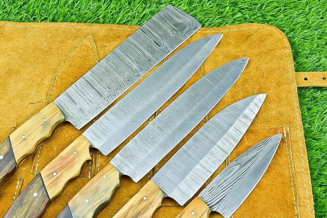 Macro view of the razor sharp satin finish edge on a handm forged 384 layer Damascus steel kitchen knife.