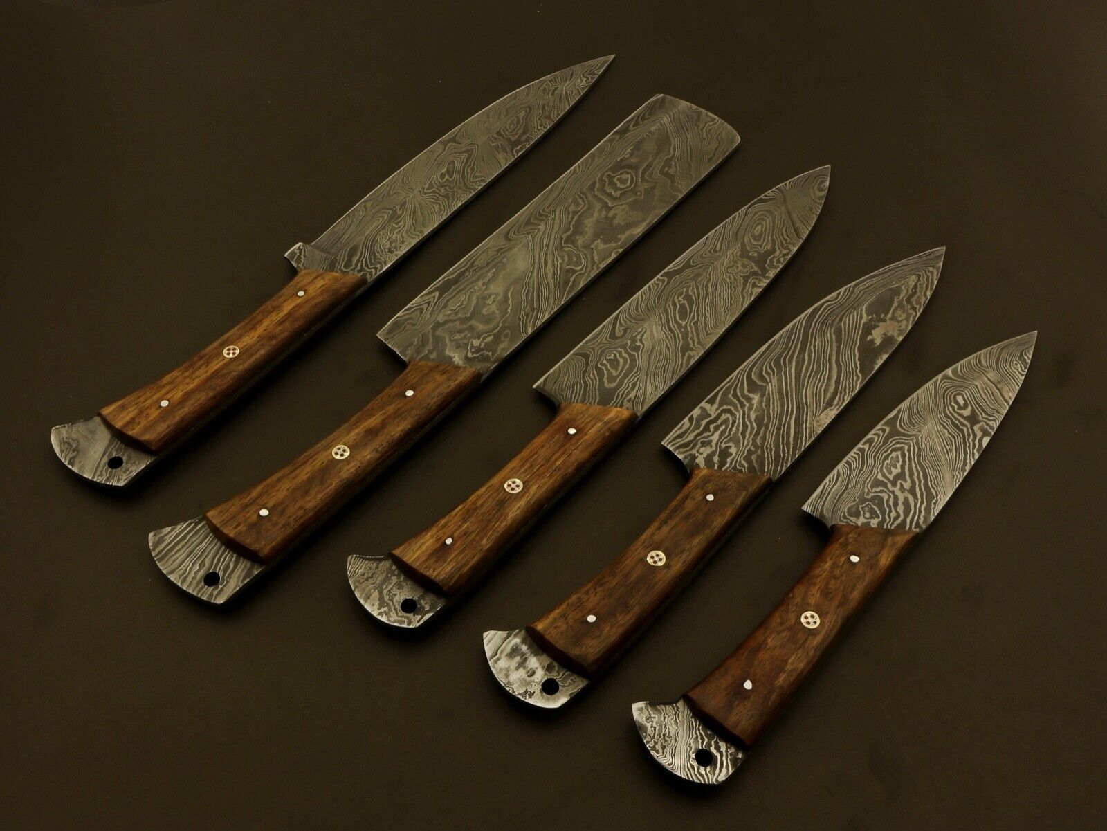 Hand forged Damascus steel blade with balanced wood handle, built for professional culinary precision.