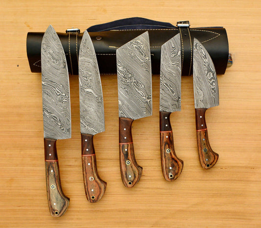 Handmade 5 pieces Damascus steel chef knife set neatly organized in a professional hand tooled leather roll.