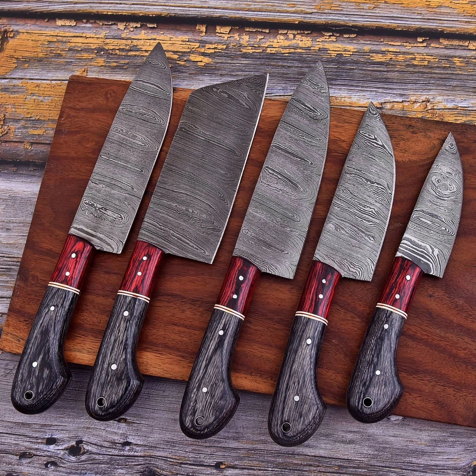 Professional 5 pieces custom Damascus steel kitchen knife set featuring hand engraved bone handles and decorative mosaic pins.