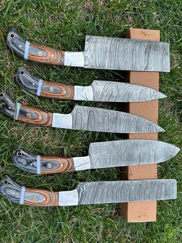 Handmade Damascus steel chef knife with 512 layer twisted pattern and full tang construction.