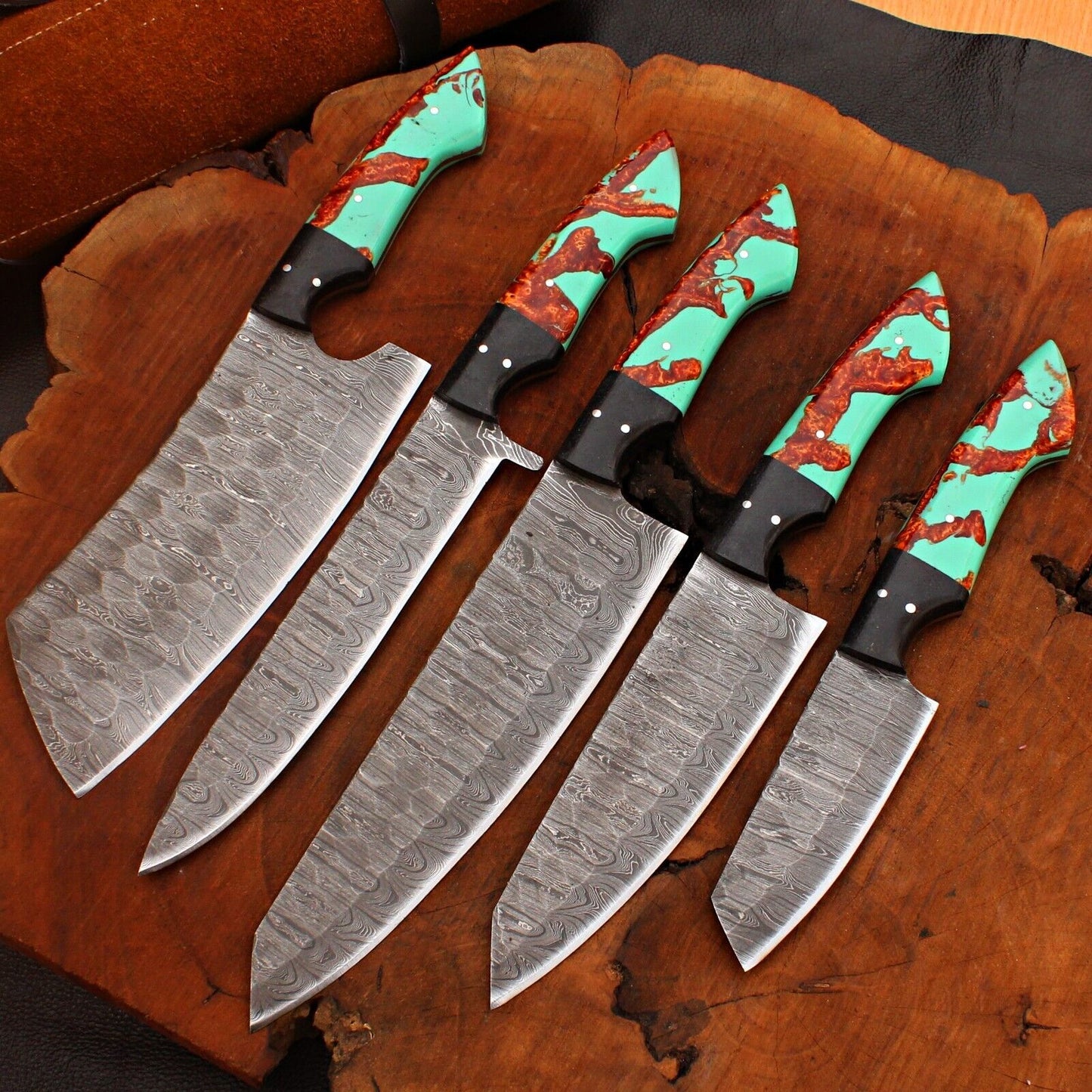 Close up of premium custom knife handle material on a professional Damascus steel kitchen knife, showcasing expert craftsmanship.
