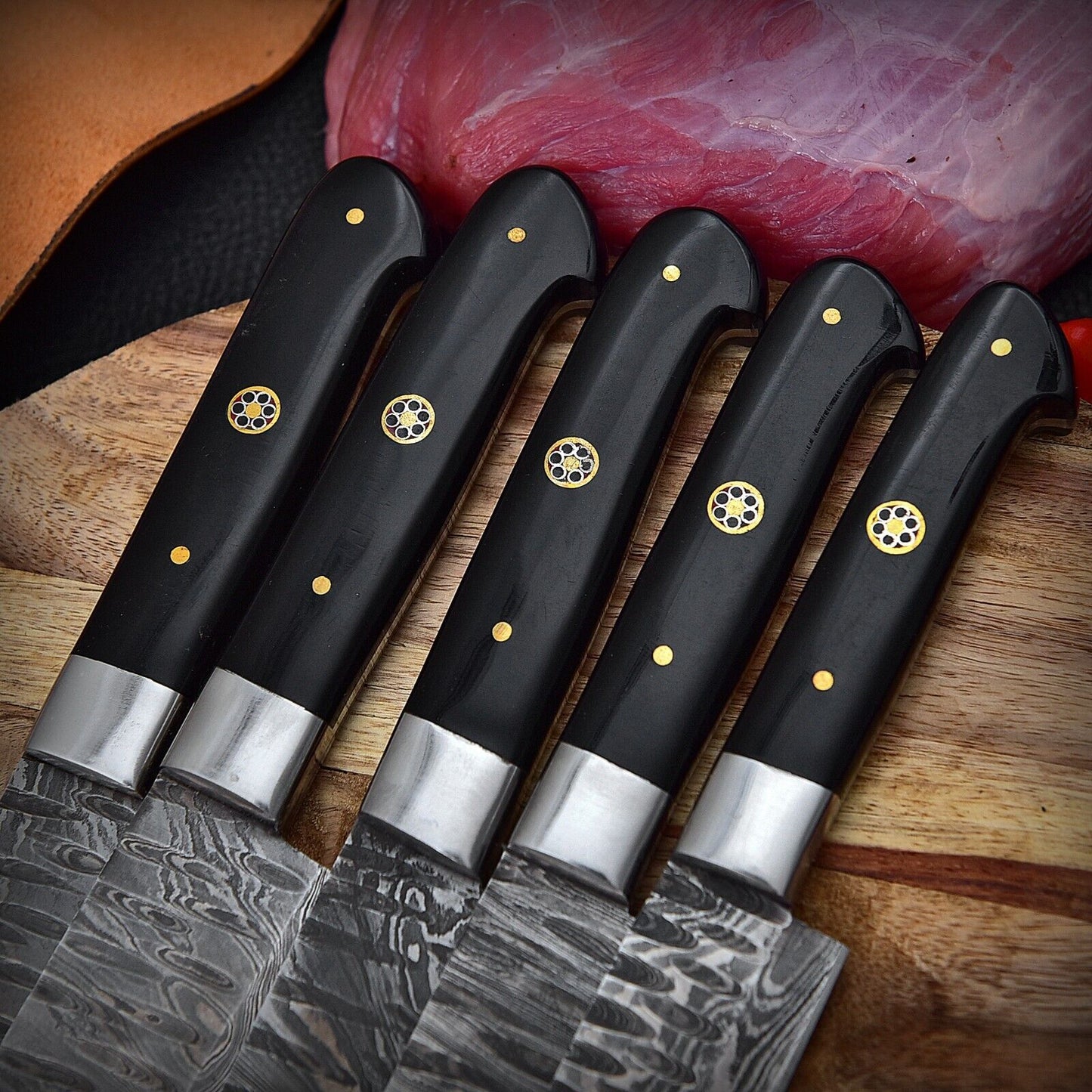 Close up of a precision Damascus steel paring knife, showcasing professional file work and high carbon steel craftsmanship.