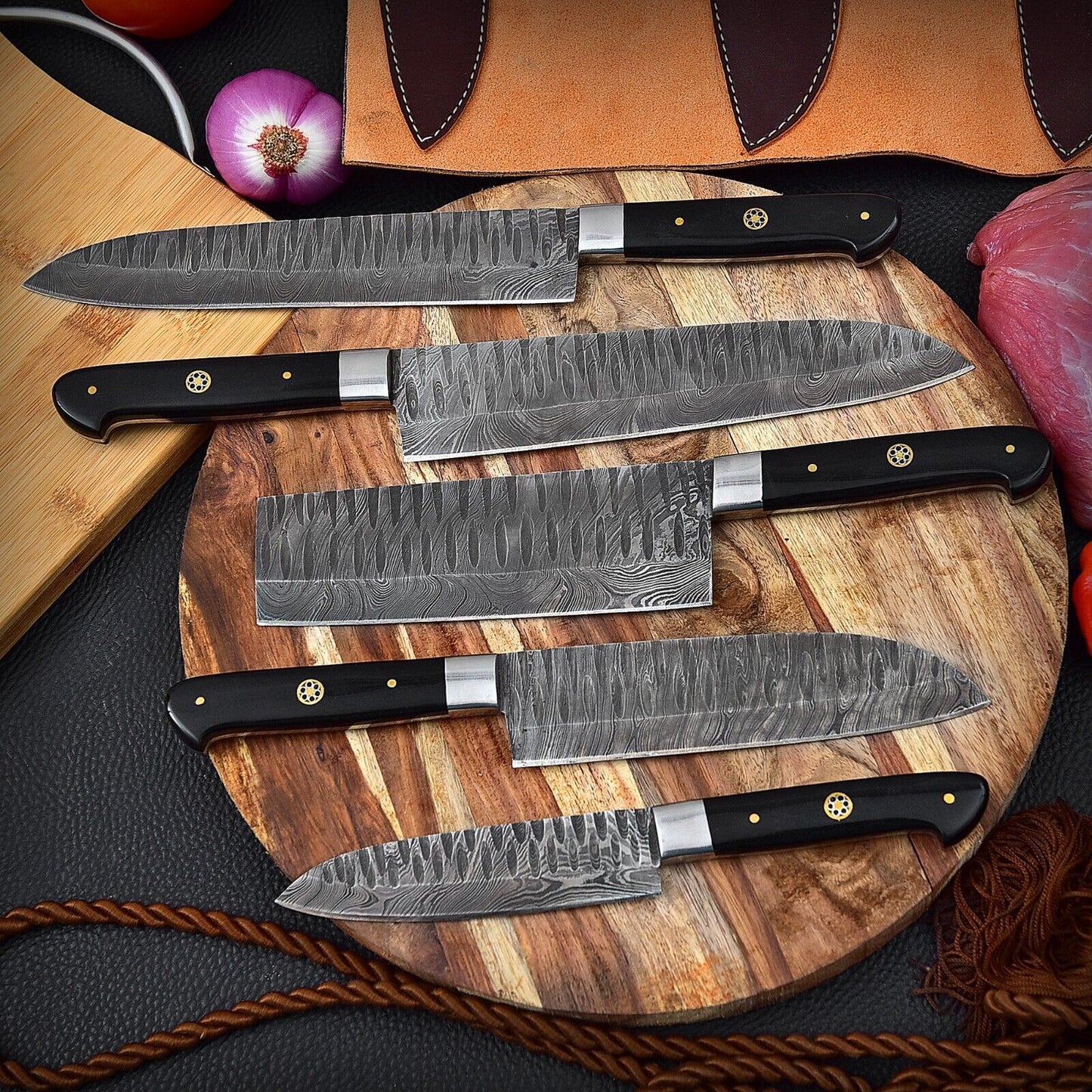 Detail view of the intricate 512 layer Damascus twist pattern and hand forged spine file work on a professional kitchen knife blade.