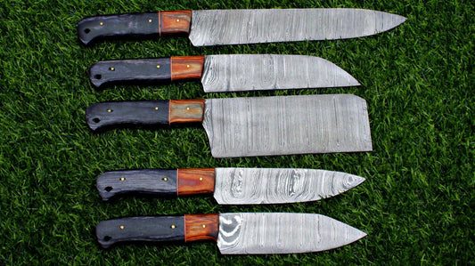 5 pieces custom handmade Damascus chef knife set with forged steel blades on a rustic wooden background.