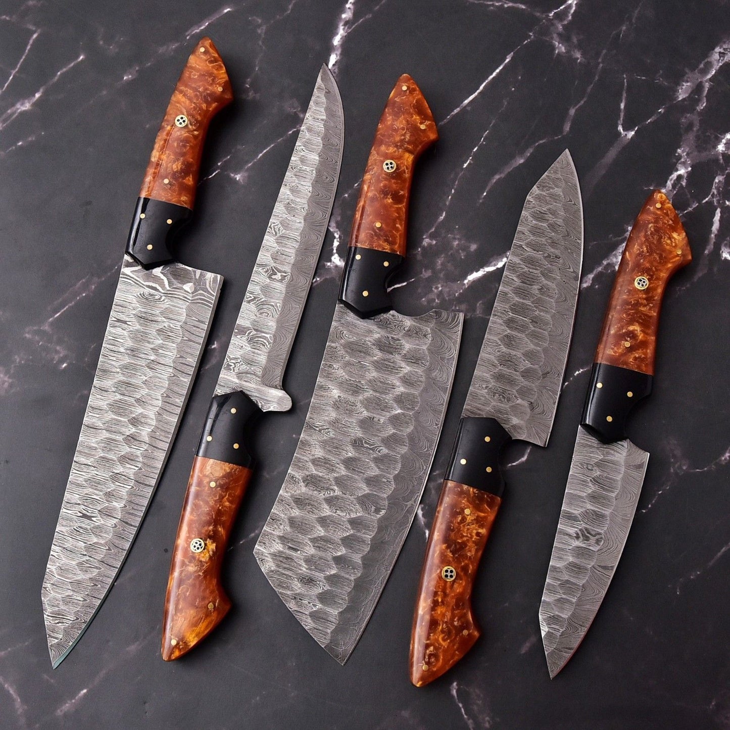 Hand forged Damascus steel blade with unique pattern and razor sharp edge on handmade kitchen knife.