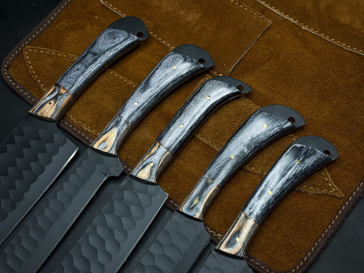 Hand forged carbon steel hunting and survival knife with durable full tang wood handle.