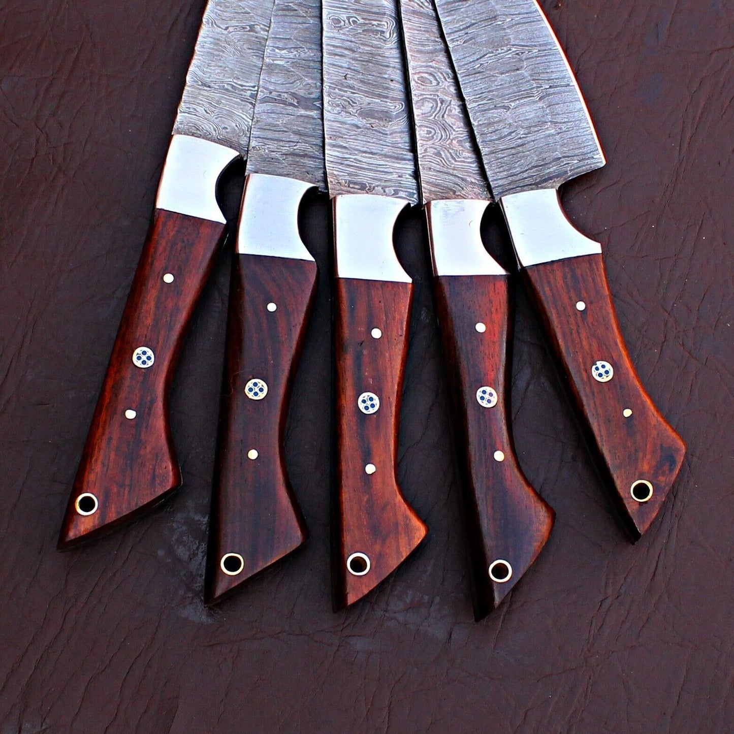 Hand finished ergonomic knife handle made from premium materials, highlighting the custom craftsmanship of our chef knife set.