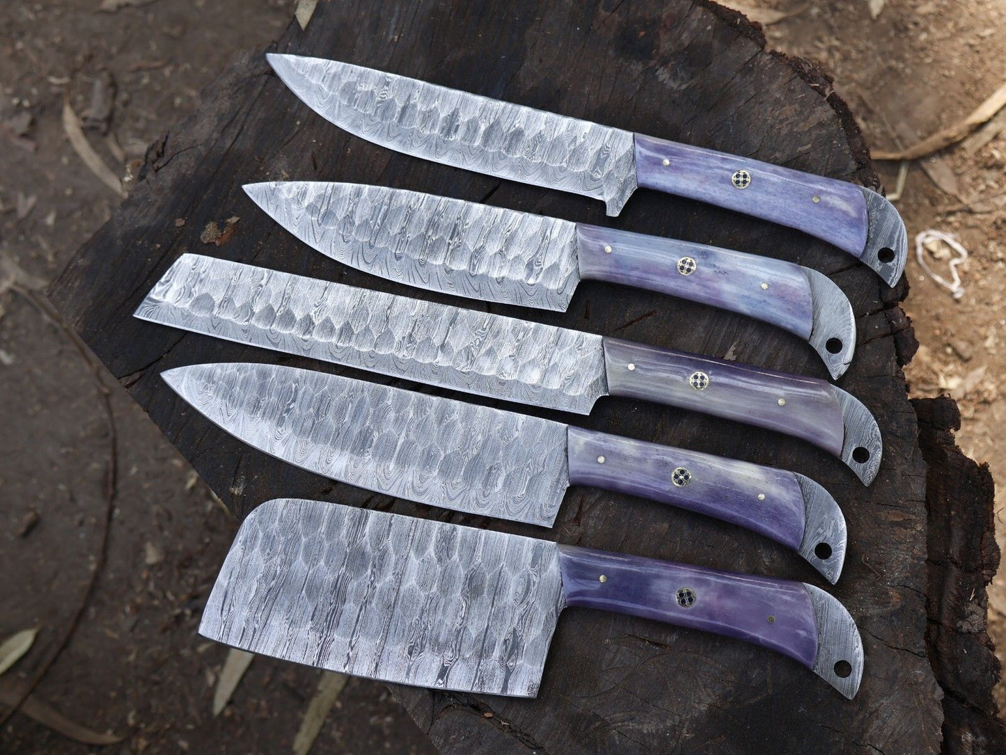 Close up of 512 layer hand forged Damascus steel pattern on a professional kitchen knife blade.
