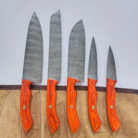 Hand forged 5 pieces Damascus steel chef knife set featuring vibrant Pukka Wood handles and durable steel bolsters.