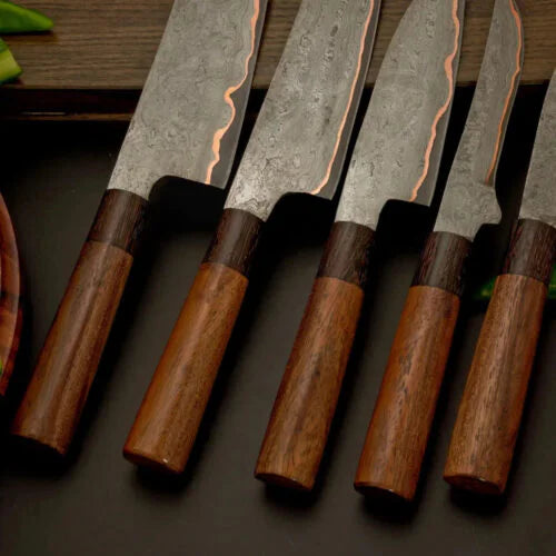 Detailed view of 5 pieces handcrafted Damascus steel kitchen knife wooden handles and sharp blades