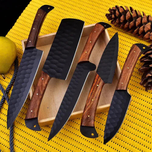Flat lay view of 5 pieces black hammered culinary knife set with rich wooden handles