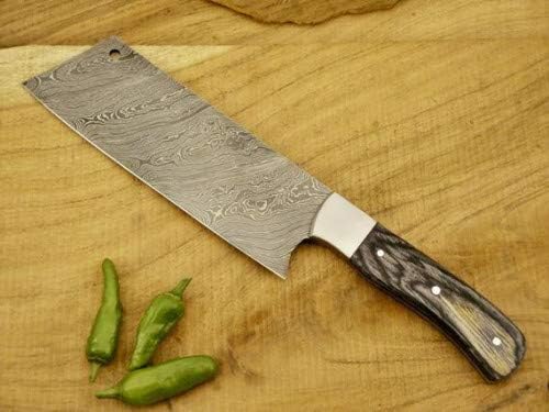 Close up of Damascus wide cleaver with pakka wood handle