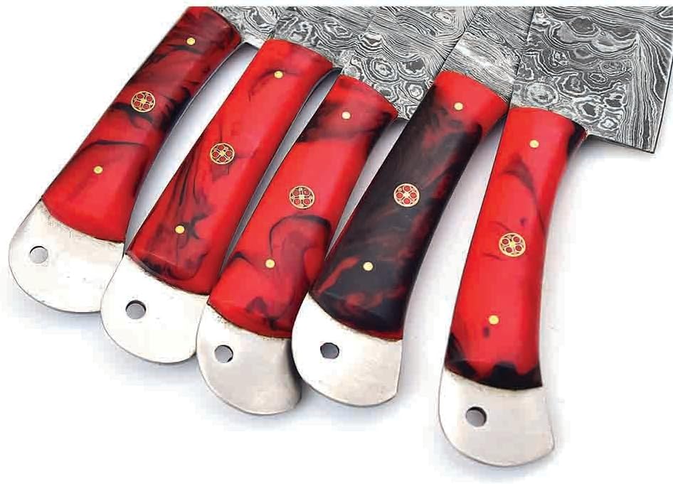 Close up of red and black marbled handles with brass mosaic pins