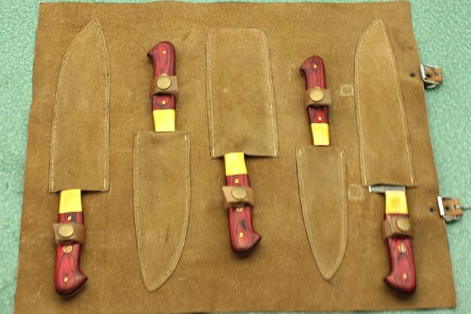 Open leather sheath board showing red pakka wood handle knives resting above their sheaths