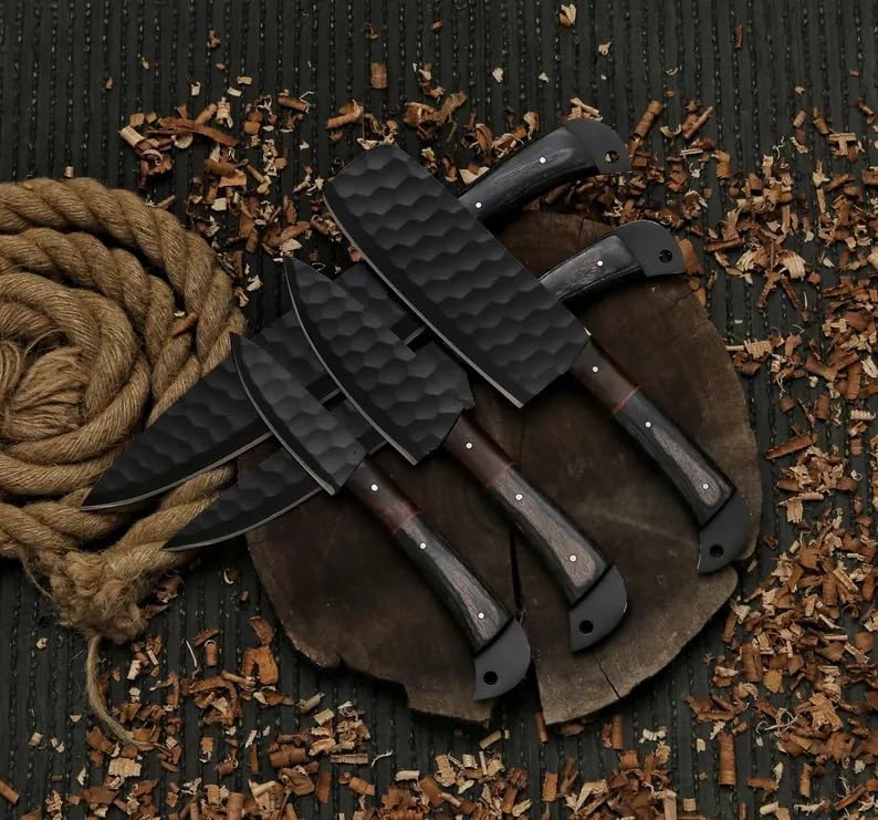 Black hammered cleaver and chef knives with two tone wood handles on a wood round