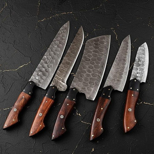 5 pieces handmade Damascus steel chef knife set with leather roll bag displayed on rustic wood surface.