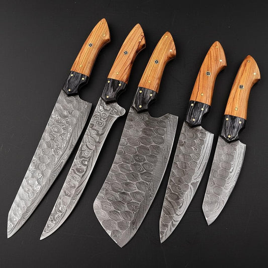 Closeup of Damascus steel blade showing the seller described twist pattern and decorative filework