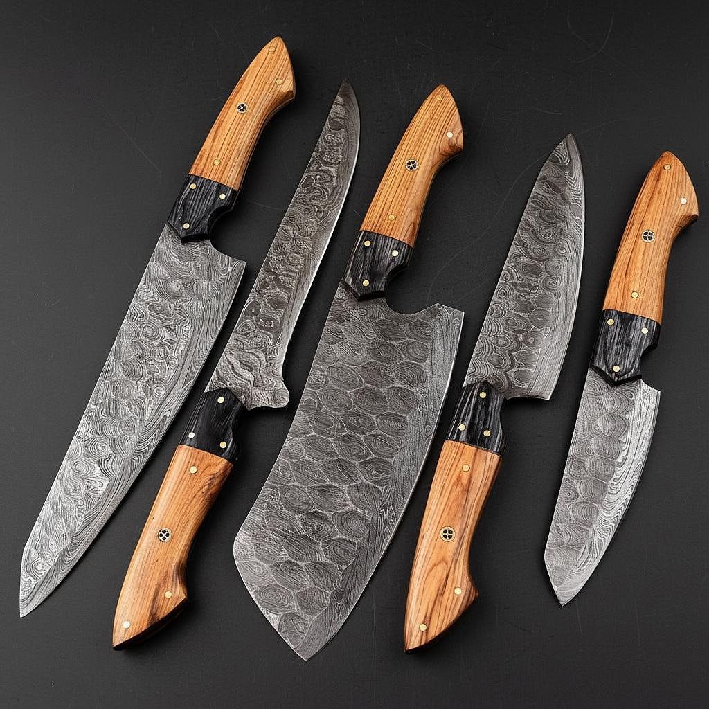 Professional Damascus steel cleaver and Santoku knife resting on a rustic wood surface, highlighting rugged craftsmanship.