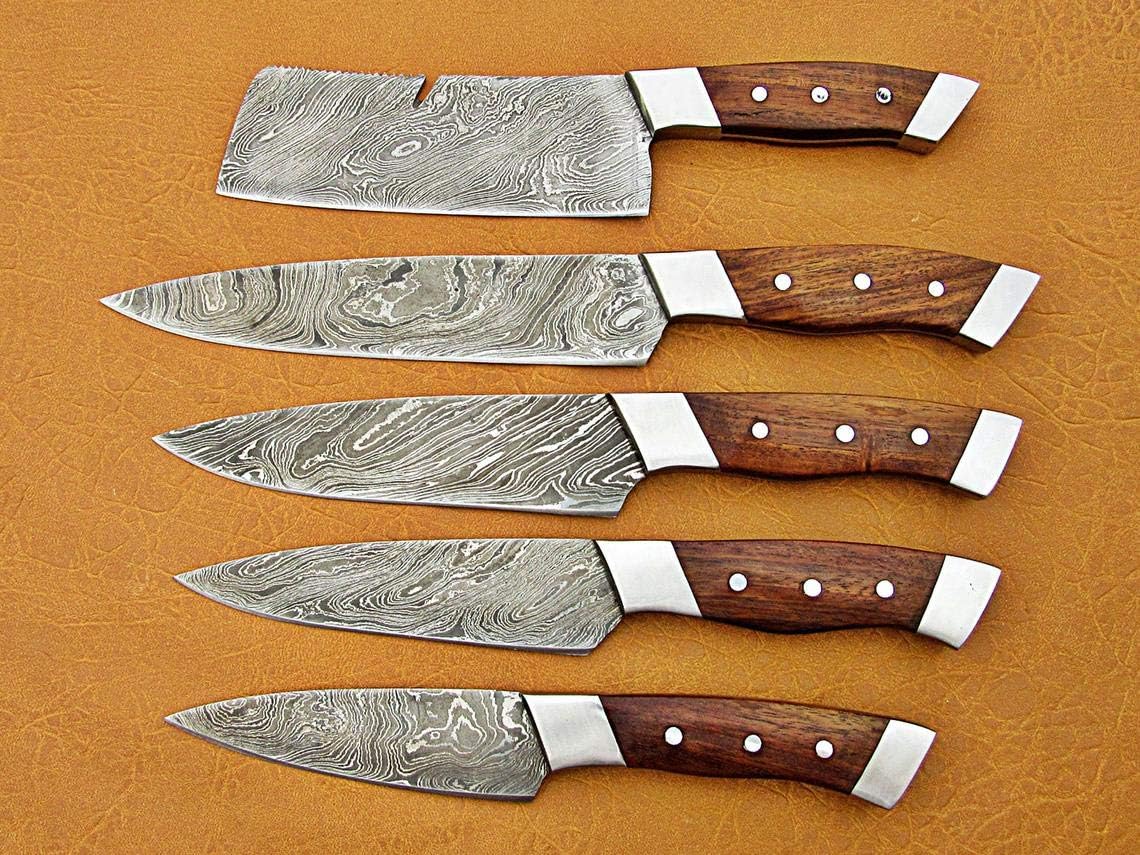 5 Pieces Damascus Steel Chef Knife Set lined up horizontally, showing pakkawood handles and polished bolsters