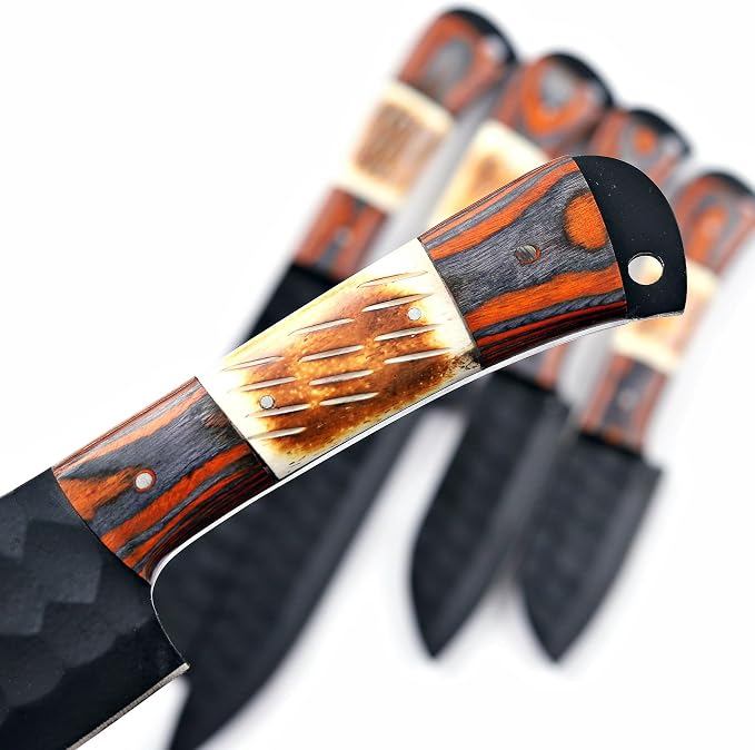 Close up of wood and bone knife handles