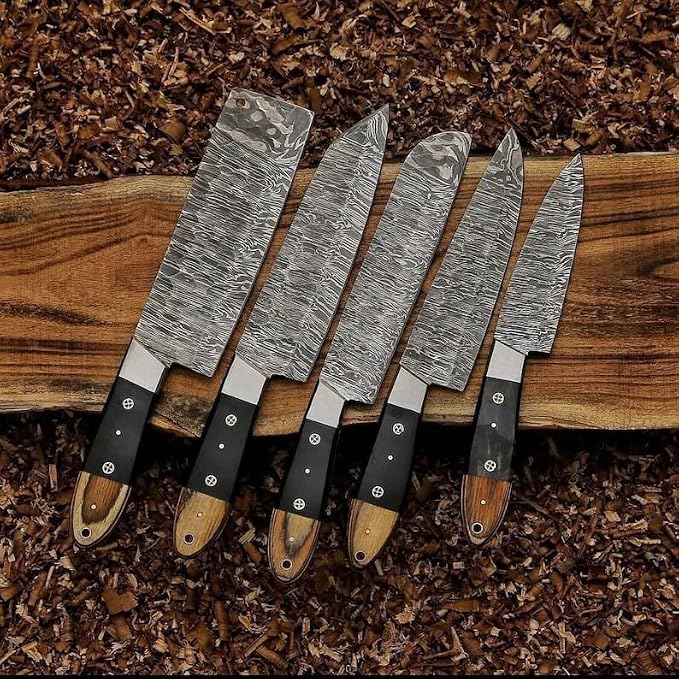5 piece Damascus knife set with pakka wood handles fanned on wood board