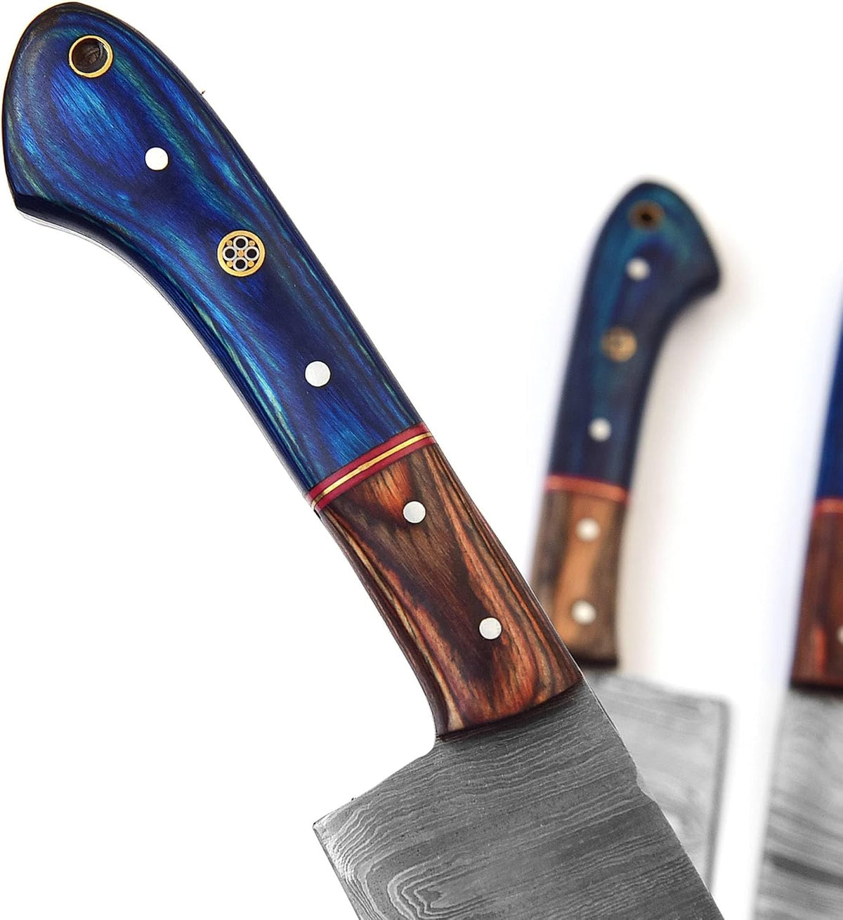 Blue pakkawood knife handle with brass mosaic pins, red spacers and a lanyard hole