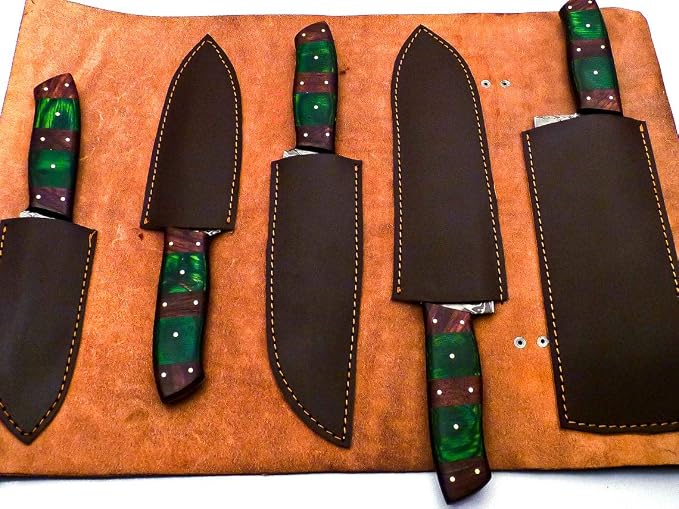 Open dark leather case holding Damascus knives with green and red striped handles