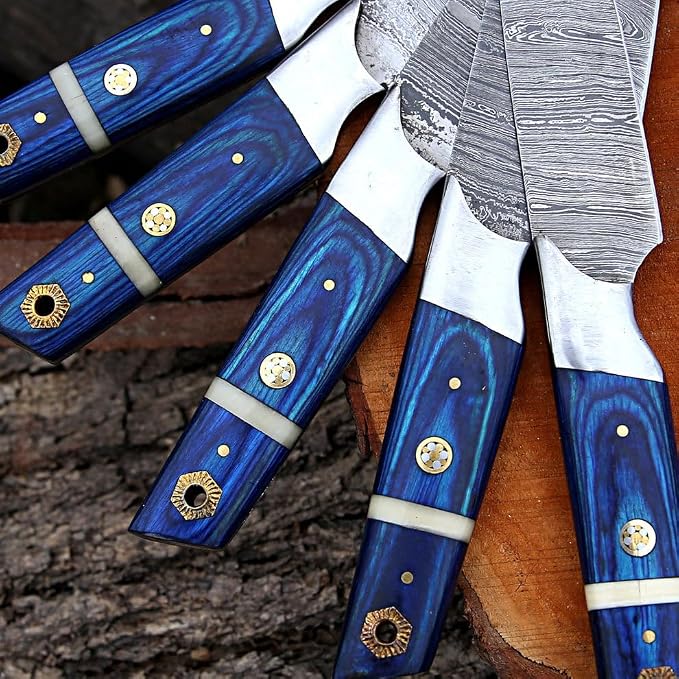 Close up of blue knife handles with bone spacers