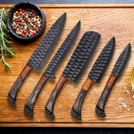 5 Pieces Damascus Steel Chef Knife Set on wood board beside rosemary, peppercorns and sea salt flakes