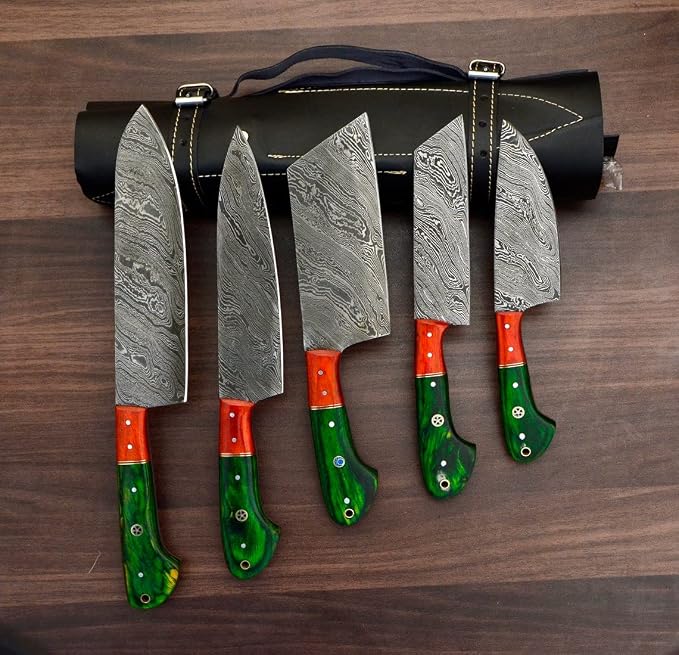 Damascus steel knife set with orange and green pakka wood handles beside a black roll case
