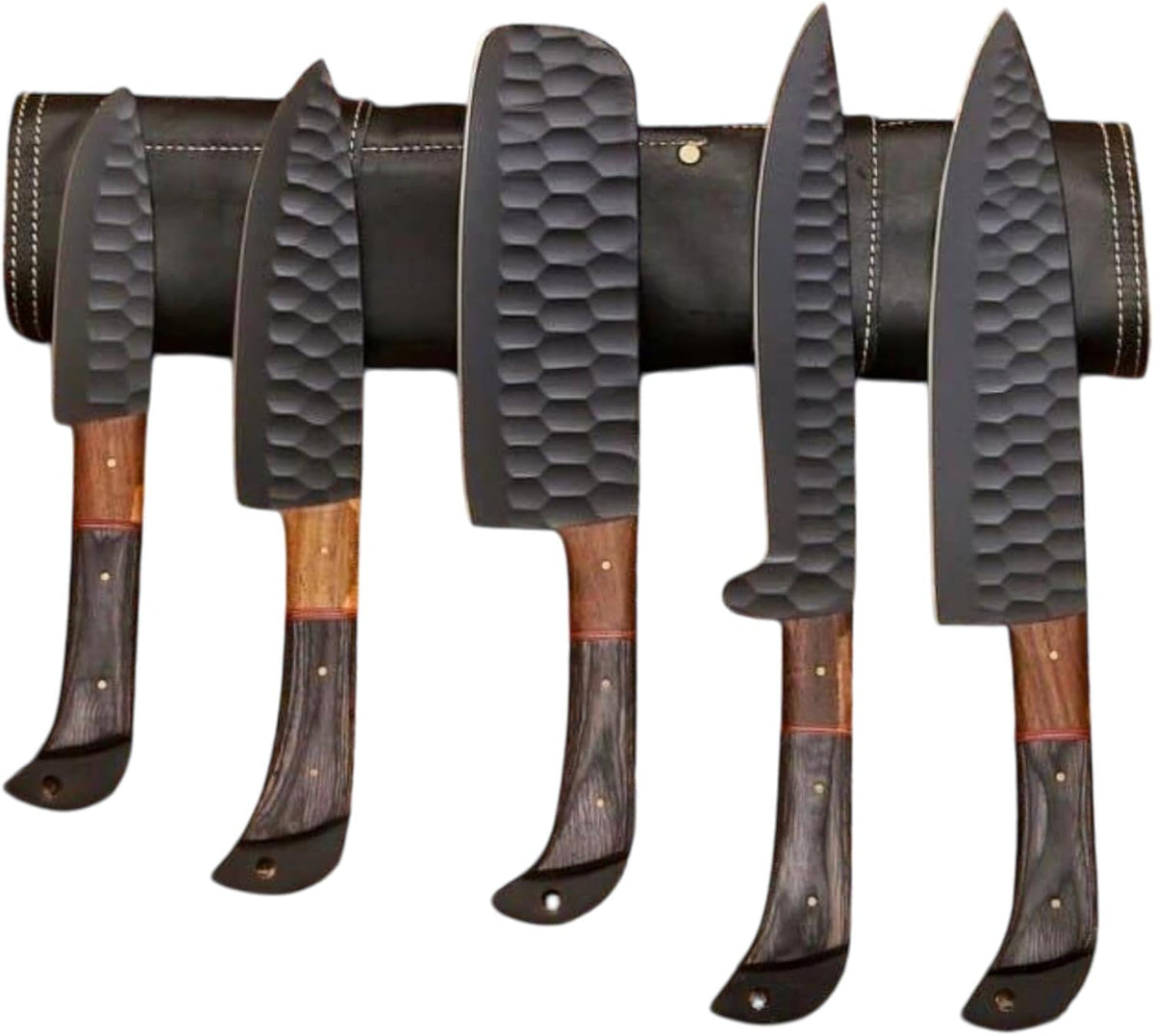 Five black kitchen knives with honeycomb blades tucked into a rolled leather knife roll