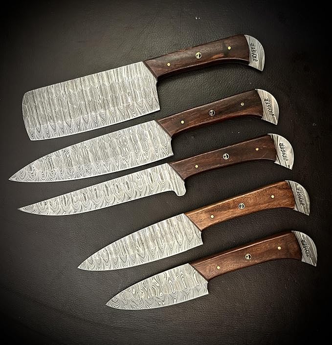 5 Damascus steel knives with wood handles lined up vertically