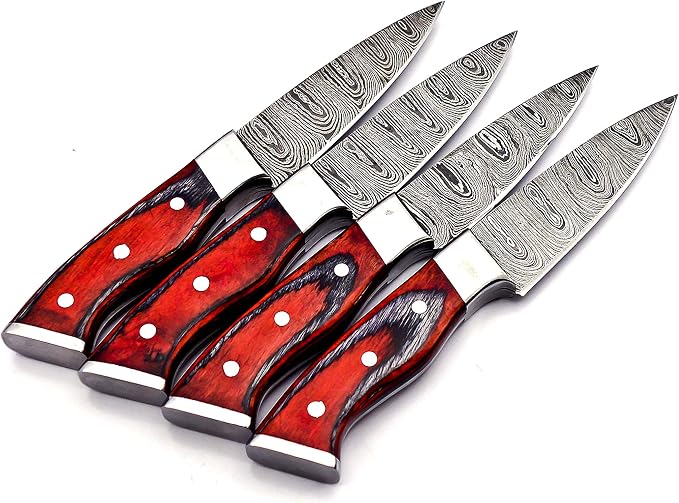 4 Damascus steak knives with red pakka wood handles in a diagonal row