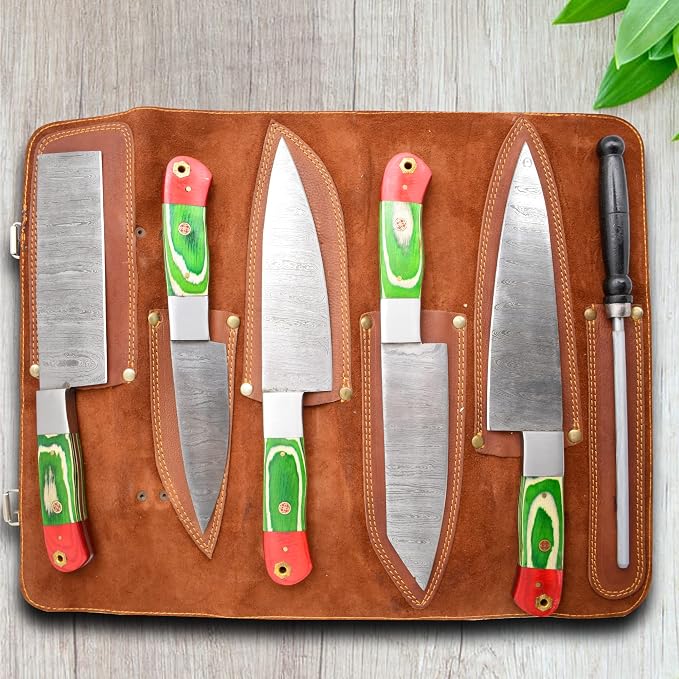 Open tan leather roll case showing green and red pakka wood handle knives and a sharpening rod