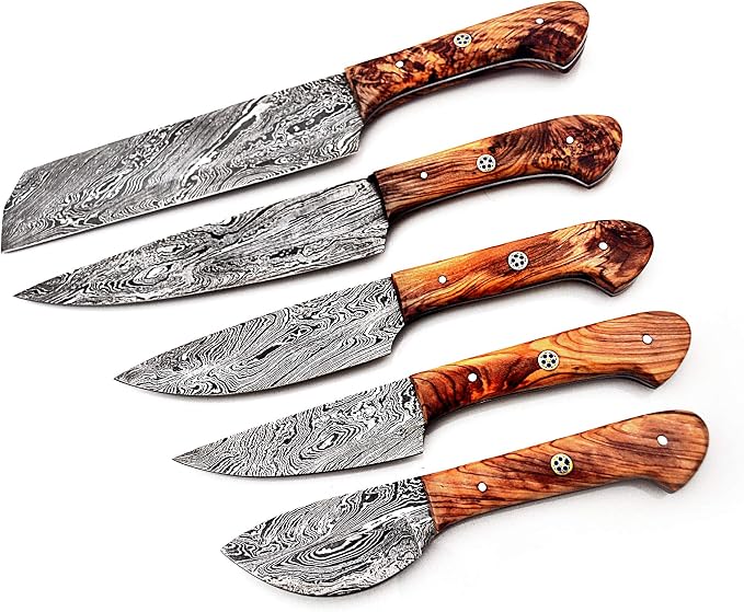 5 piece Damascus steel knife set with pakka wood handles arranged in a mirrored fan on white background