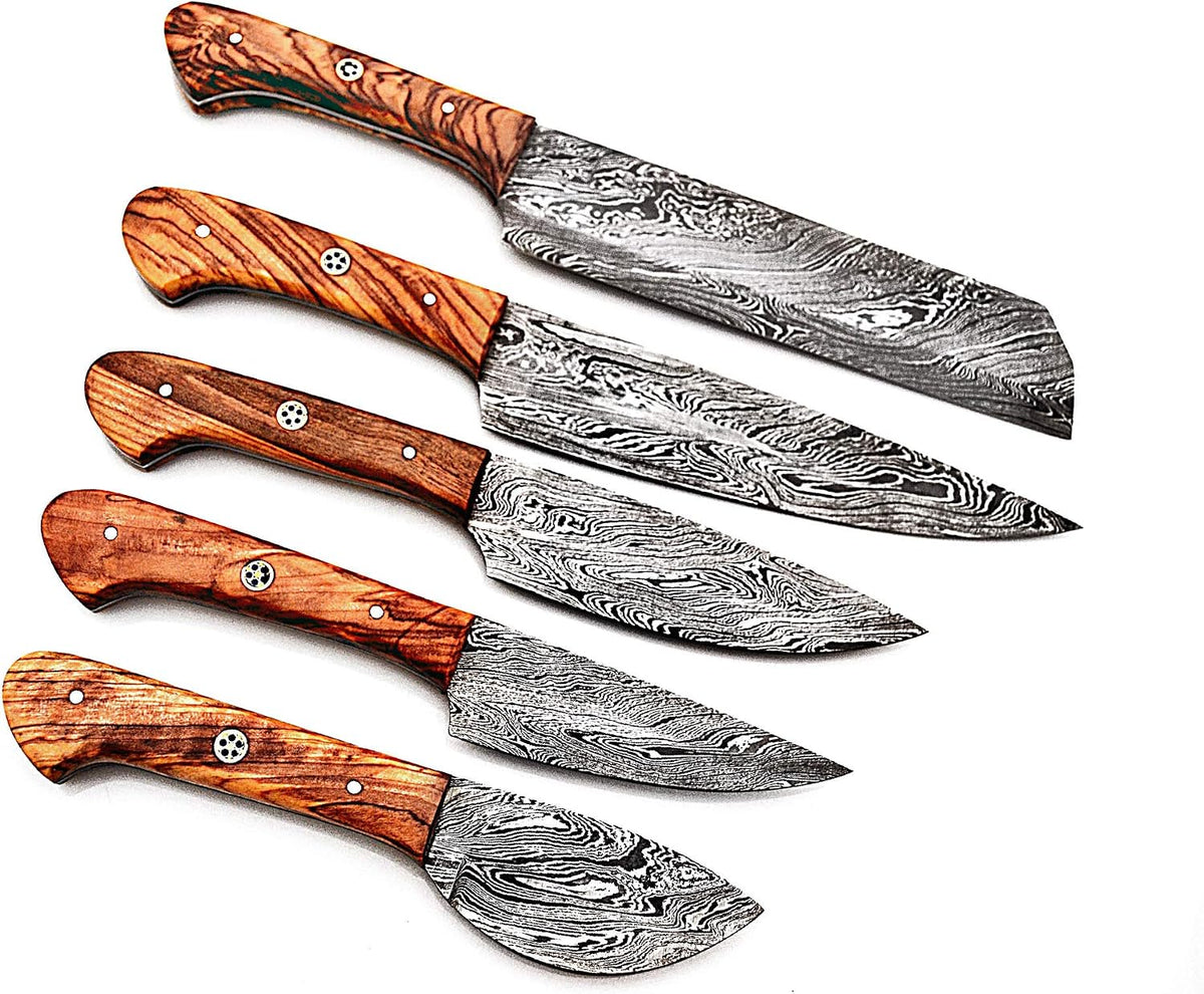 Five Damascus knives with olive wood handles laid out from cleaver to paring