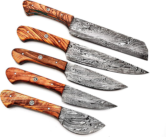 Five Damascus knives with olive wood handles laid out from cleaver to paring