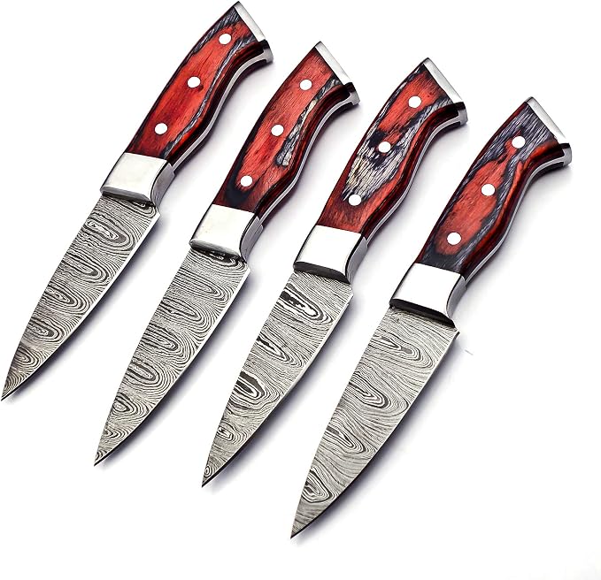 4 Damascus steak knives with red pakka wood handles fanned on white