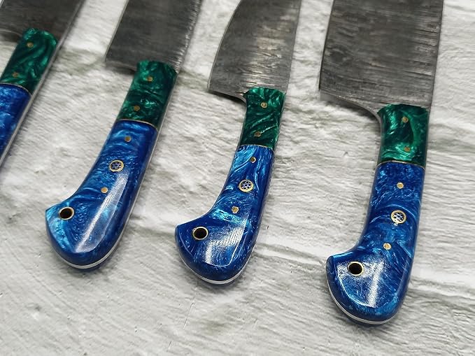 Close up of green and blue knife handles