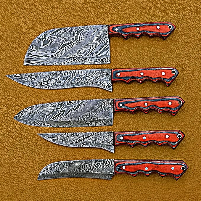 5 Damascus knives with red handles and black trim on leather