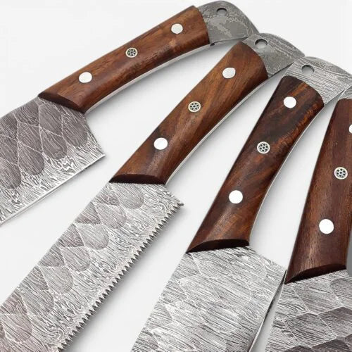 Close up view of hand forged hammered Damascus steel knife handles made of pakka wood