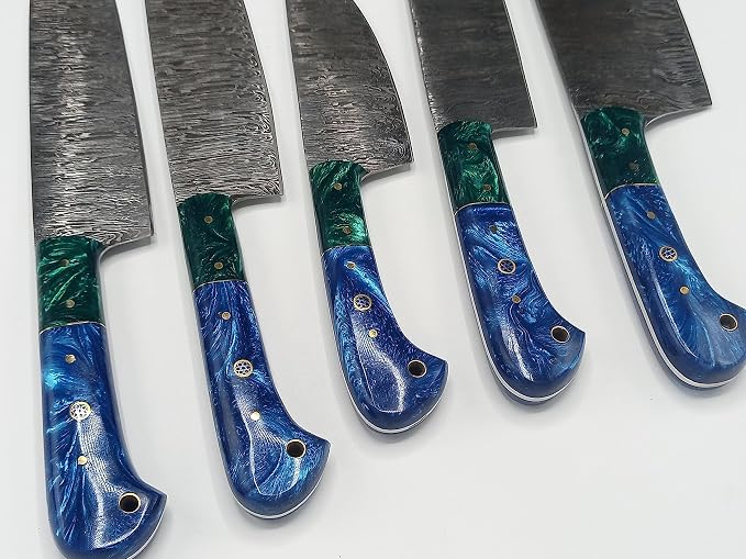 Close up of green and blue knife handles with brass pins