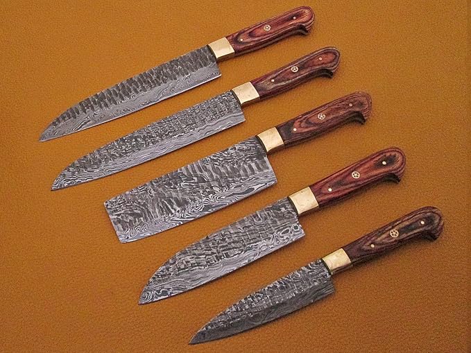 5 piece pakka wood Damascus knife set fanned out on leather