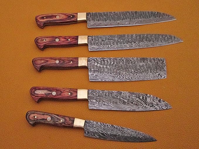 5 pakka wood handle Damascus knives in rows on leather background
