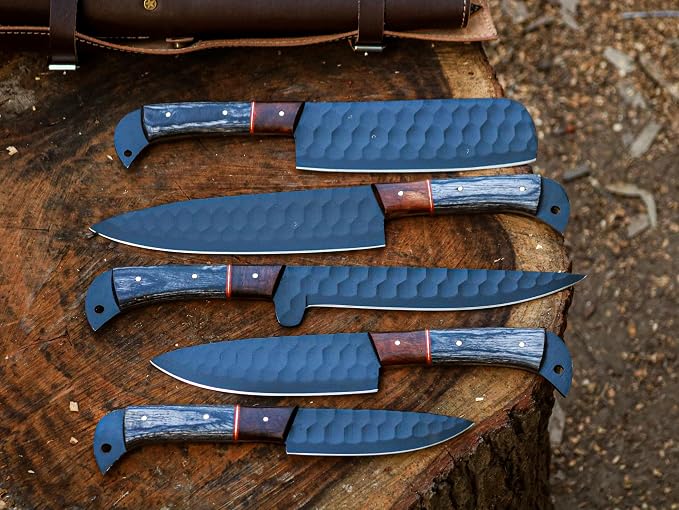 5 piece knife set with black blades close up